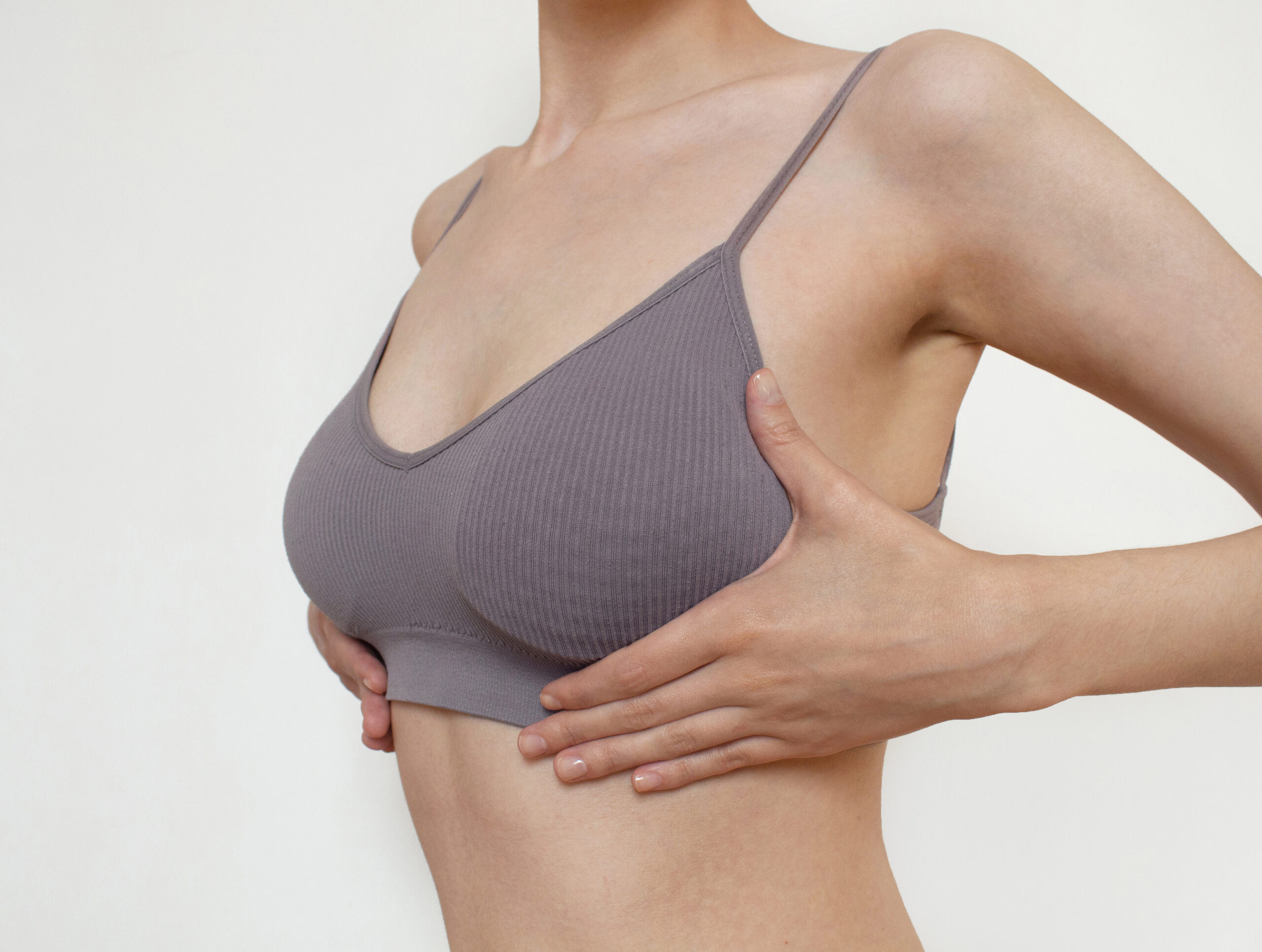 Woman breast in lingerie breast lift 